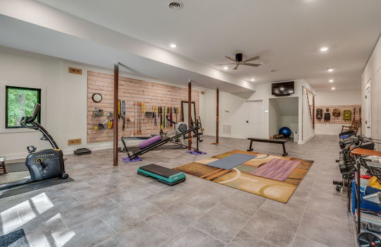 main home lower level, recreation roomn, storage, tile flooring