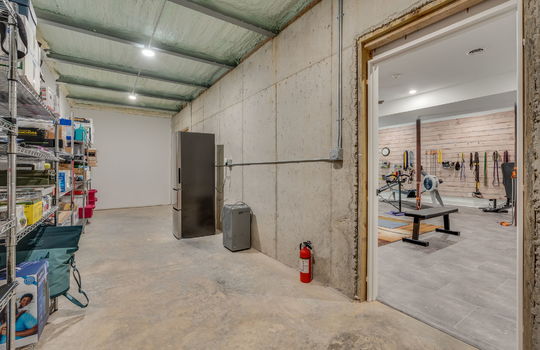 basement storage space, concrete flooring