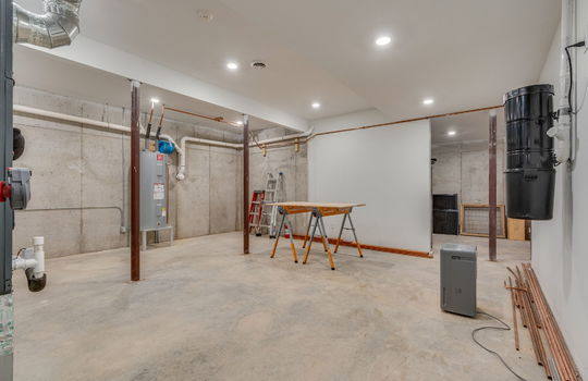 worshop, concrete flooring, recessed lighting