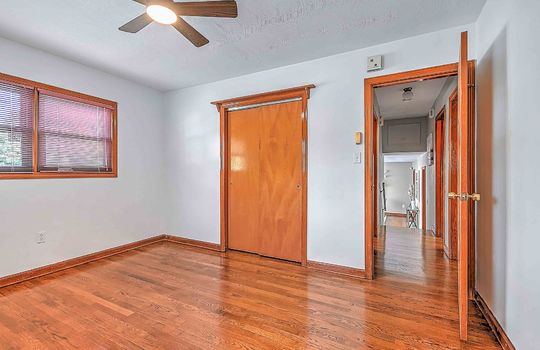 bedroom, window, hardwood flooring, closet, door to hallway