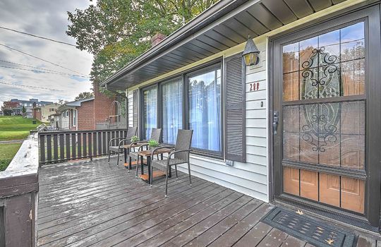 front porch, front door, storm door, windows, vinyl siding