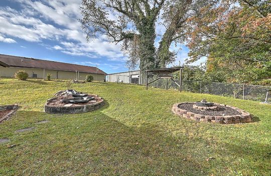 back yard, fencing, swing, landscaping