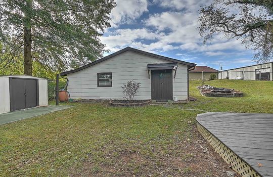 back yard, storage shed, workshop, fencing, back patio