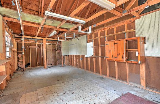 workshop interior, cabinets, concrete flooring