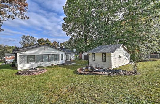 back yard, back of home, fencing, landscaping, workshop, storage sheds