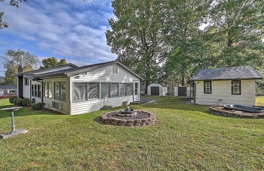 back yard, back of home, fencing, landscaping, workshop, storage sheds