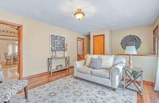 living room, entryway, hardwood flooring, closet,