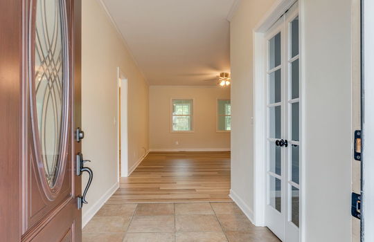 front door, entryway, tile flooring