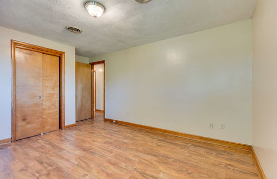 bedroom, closet, laminate flooring