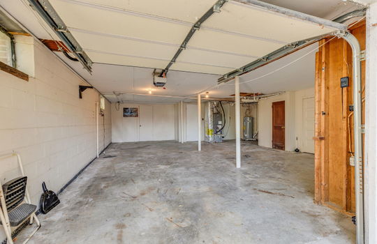 garage, garage door, interior doors, concrete flooring