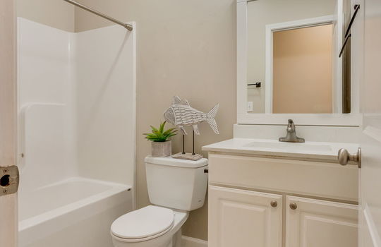 bathroom, tile flooring, sink, toilet, shower/tub