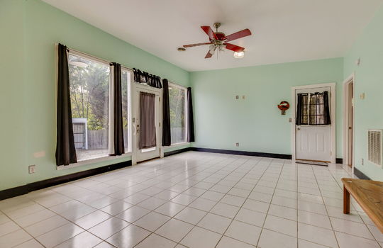 kitchen, front door, side door, tile flooring, dining area