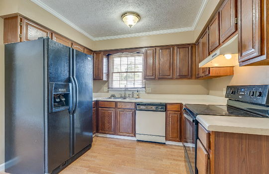 kitchen, refrigerator, dishwasher, oven/range, cabinets, countertops, sink, window above sink