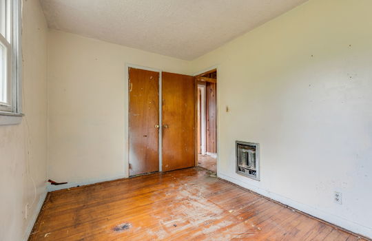 bedroom, hardwood flooring, closet, fixer upper