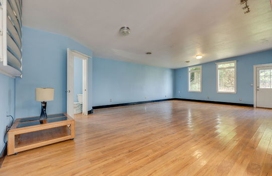 living room, windows, front door, door to half bath