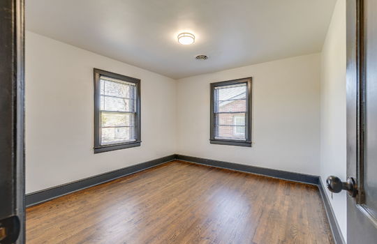 bedroom, hardwood flooring, windows, door