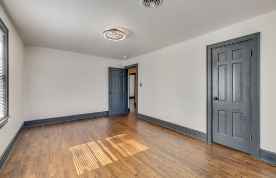 bedroom, closet, hardwood flooring, window