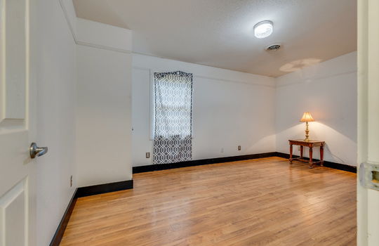 bedroom, laminate flooring, closet, window