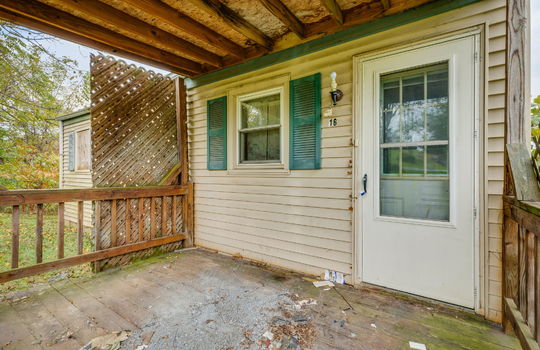 covered back porch, back door, vinyl siding, fixer upper