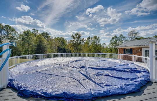 Above ground pool, back yard, fenced above ground pool, pool deck, trees