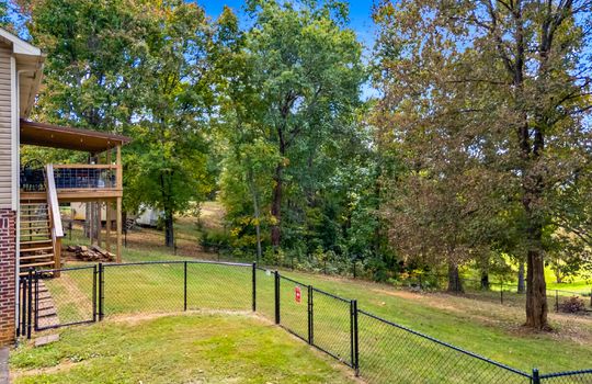 back yard, fencing, trees, landscaping, back deck, covered back deck