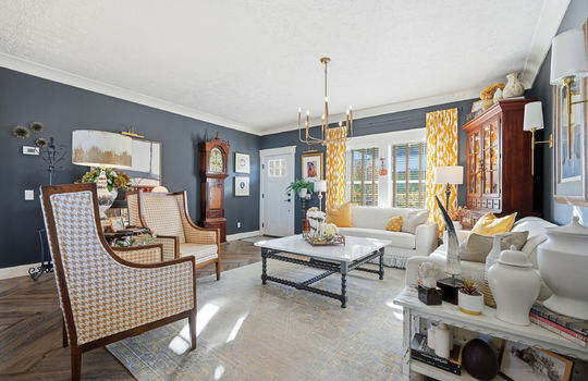 living room, windows, front door, luxury vinyl flooring