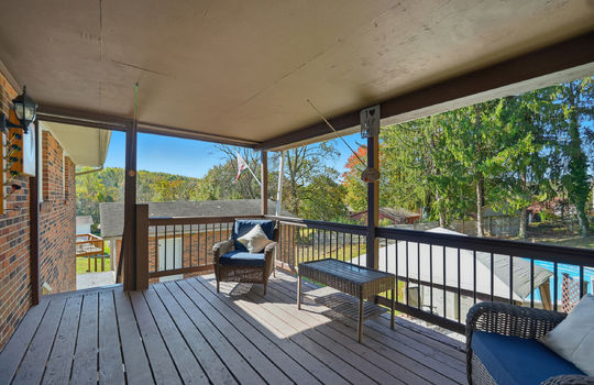 back deck, covered back deck, pool, trees, fencing
