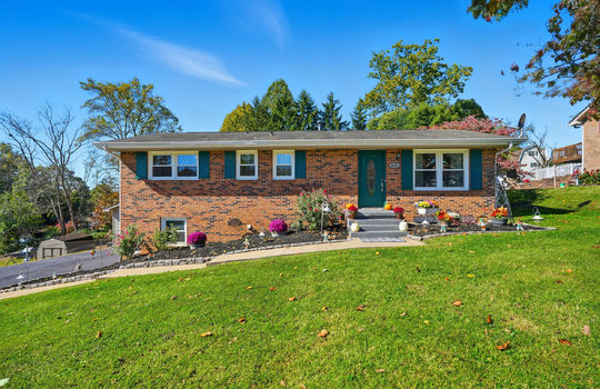 brick ranch, brick exterior, front door, front steps, sidewalk, front yard, landscaping, driveway