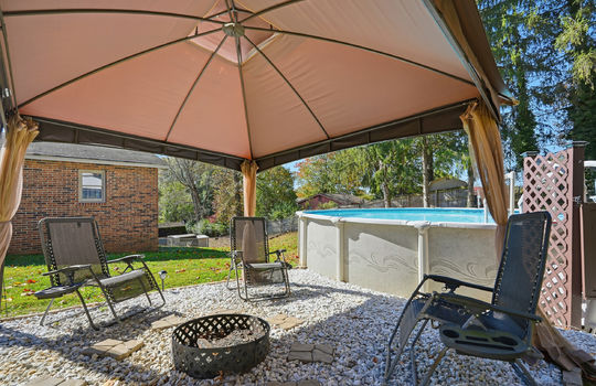 back yard, seating area, above ground pool