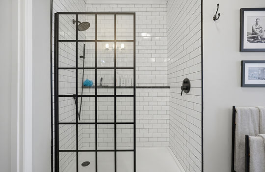 tile shower, primary bathroom, tile shower surround, glass shower partition