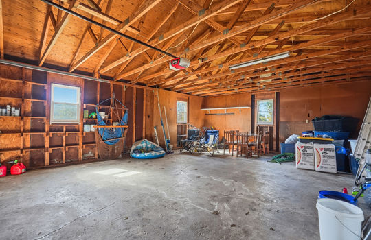 detached garage, concrete flooring