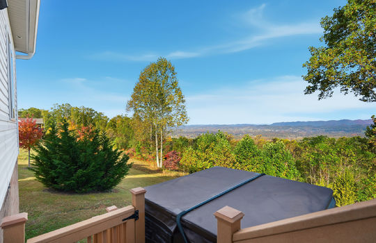 back deck, hot tub, mountain views, back yard, trees, landscaping