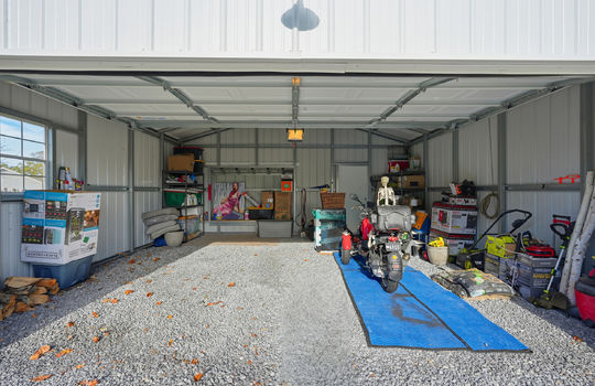 two car detached garage, gravel floor, metal garage
