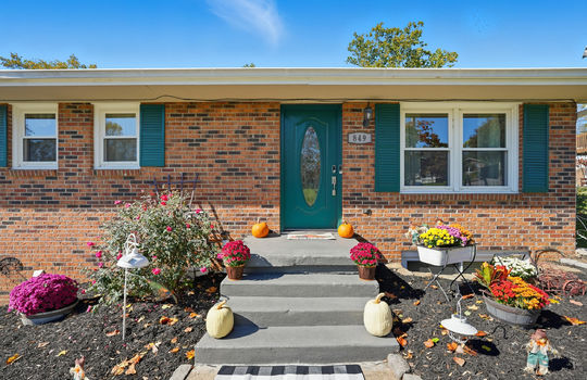 front porch, front steps, front door, landscaping, brick ranch, brick exterior, windows