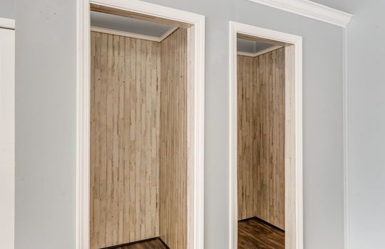 closets, storage, changing room, vinyl flooring, fluorescent lighting