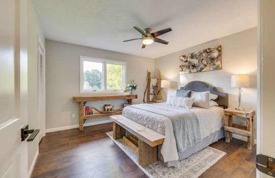 bedroom, ceiling fan, window, luxury vinyl flooring