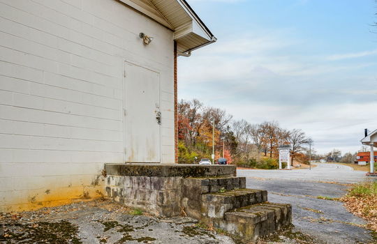 back entry door, stairs, brick