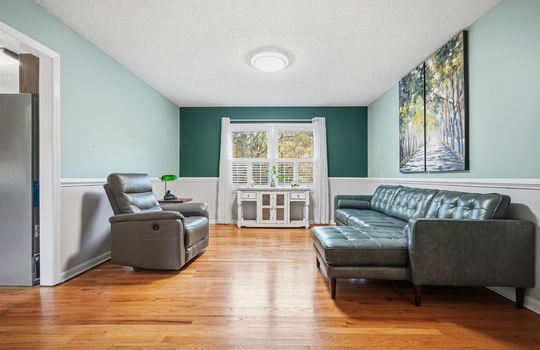 living room, hardwood flooring, windows