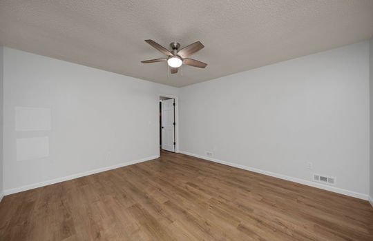 bedroom, luxury vinyl flooring, ceiling fan