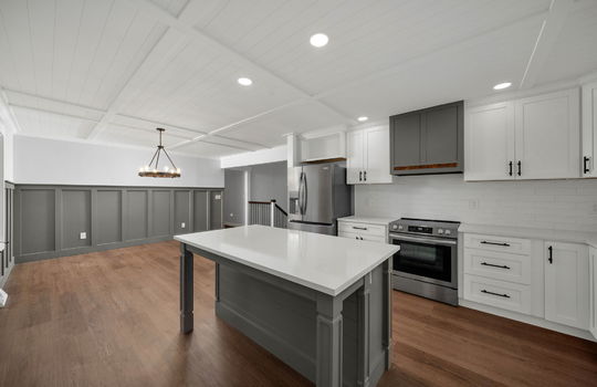 kitchen, eat-in kitchen, kitchen island, stainless appliances, refrigerator, oven/range, stone counters, cabinets,