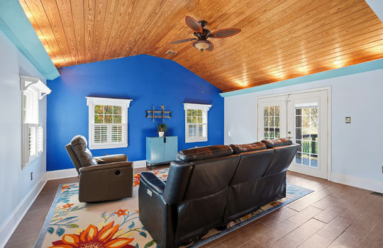 sunroom, heated sunroom, ceiling fan, windows, double doors to back deck, tongue & groove wood ceiling, tile flooring