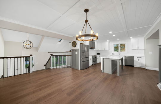 kitchen, eat-in kitchen area, luxury vinyl flooring, refrigerator, oven/range, kitchen island, dishwasher, cabinets, stone countertops, skin, window above sink, recessed lighting