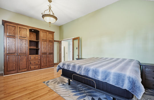 bedroom, double glass door, hardwood flooring