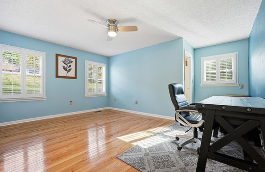 bedroom, hardwood flooring, ceiling fan, windows, ensuite bath