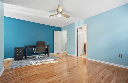 bedroom, hardwood flooring, ensuite bathroom, closet, ceiling fan