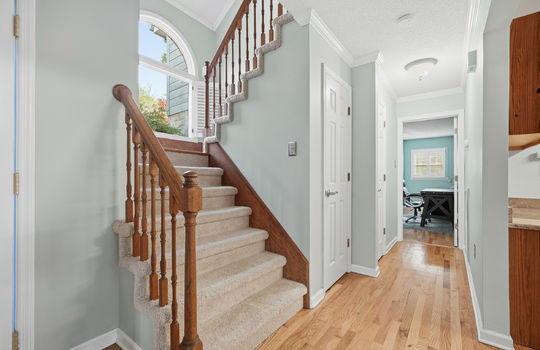 stairs to upper level, carpeted stairs