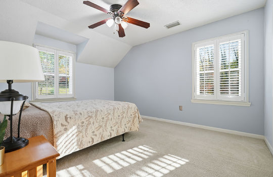 upper level bedroom, windows, ceiling fan