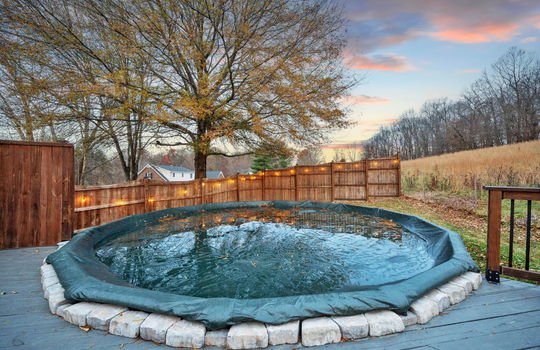 pool, fencing, decking, view of field