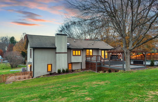 back yard, landscaping, fencing, pergola, trees, wood siding, back deck, pool