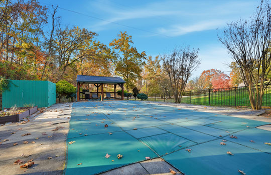 swimming pool, gazebo, saltwater swimming pool, fencing, landscaping, back yard